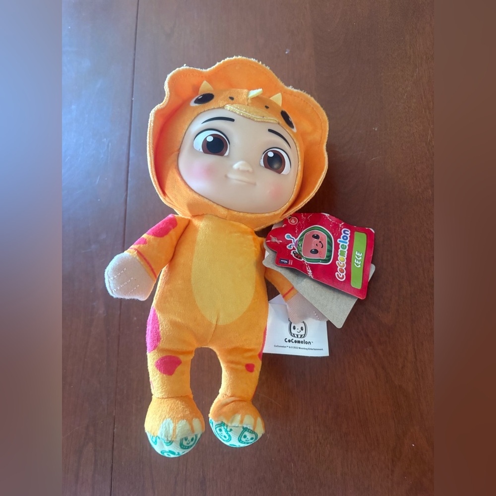 Orange Dinosaur Plush Toy by Cocomelon